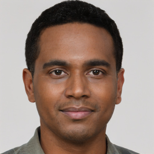 Neutral black young-adult male with short  black hair and brown eyes