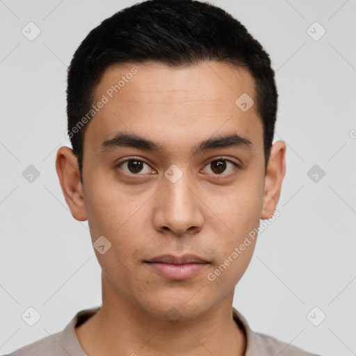 Neutral latino young-adult male with short  black hair and brown eyes