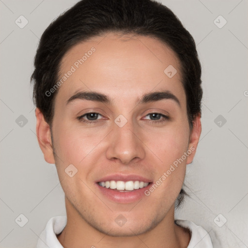 Joyful white young-adult male with short  brown hair and brown eyes