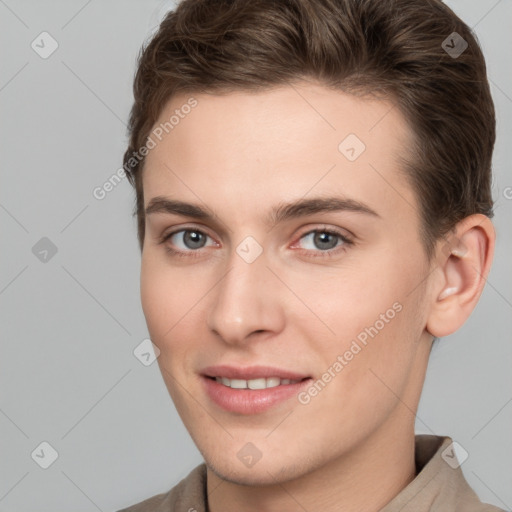 Joyful white young-adult female with short  brown hair and grey eyes