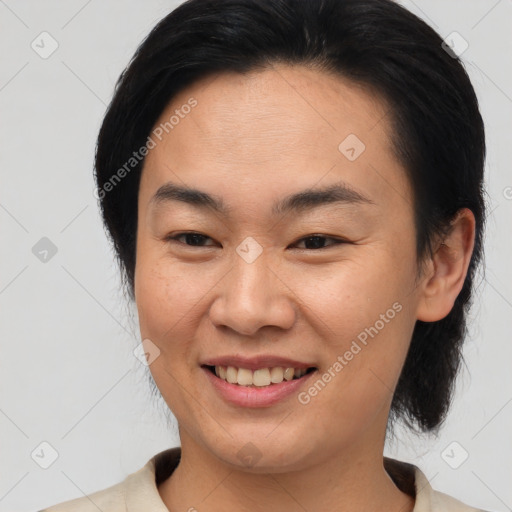 Joyful asian young-adult female with medium  brown hair and brown eyes