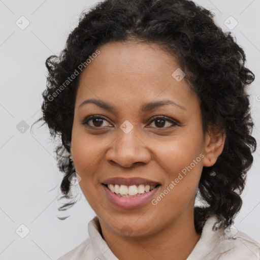 Joyful black young-adult female with medium  brown hair and brown eyes