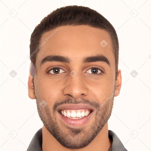 Joyful white young-adult male with short  black hair and brown eyes