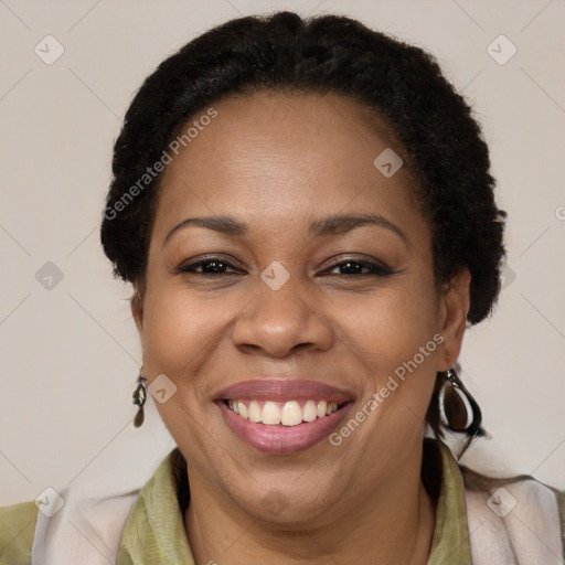 Joyful latino adult female with short  brown hair and brown eyes