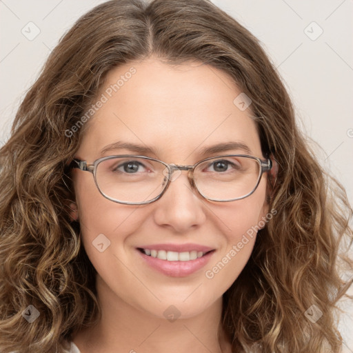 Joyful white young-adult female with long  brown hair and green eyes