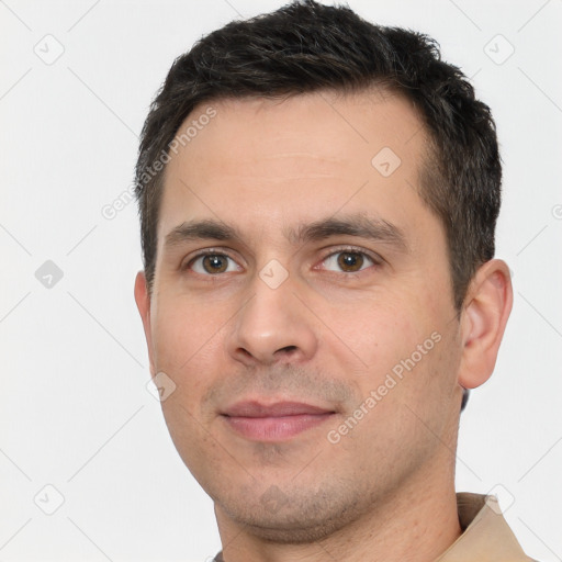 Joyful white young-adult male with short  brown hair and brown eyes