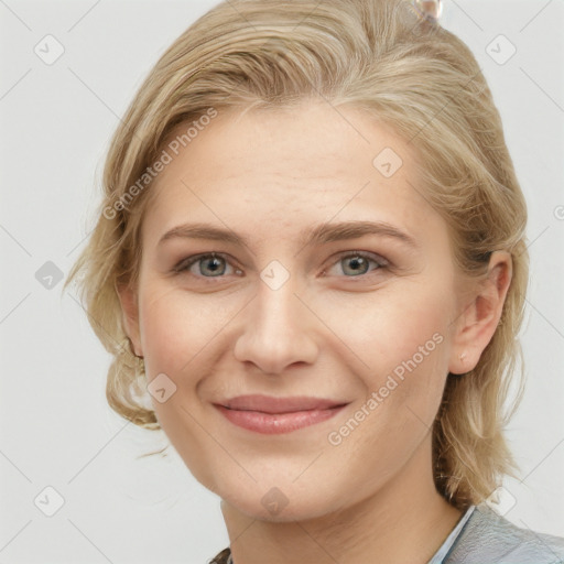 Joyful white young-adult female with medium  brown hair and blue eyes