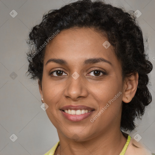 Joyful latino young-adult female with short  brown hair and brown eyes