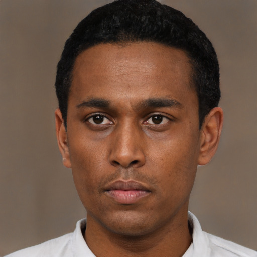 Neutral black young-adult male with short  black hair and brown eyes