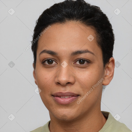 Joyful latino young-adult female with short  black hair and brown eyes