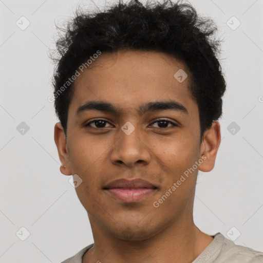 Joyful latino young-adult male with short  brown hair and brown eyes