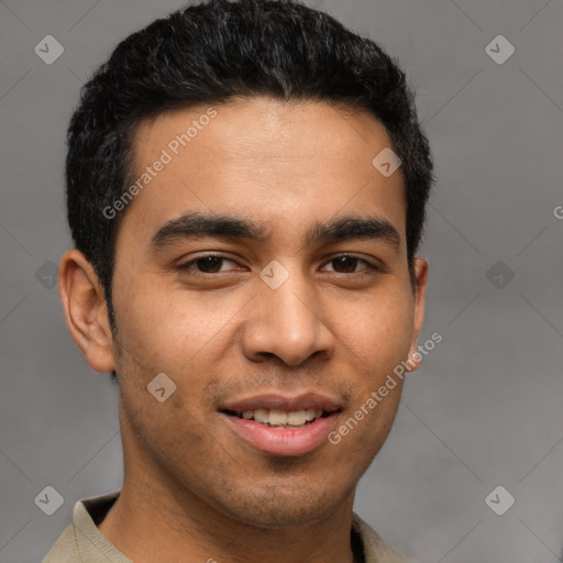 Joyful latino young-adult male with short  brown hair and brown eyes