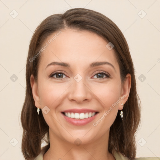 Joyful white young-adult female with long  brown hair and grey eyes