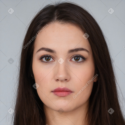 Neutral white young-adult female with long  brown hair and brown eyes