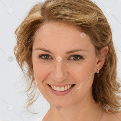 Joyful white young-adult female with medium  brown hair and green eyes