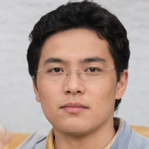 Neutral asian young-adult male with short  brown hair and brown eyes