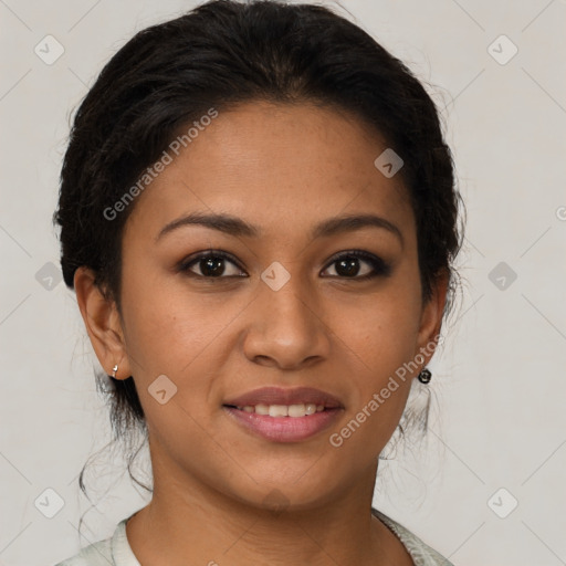 Joyful latino young-adult female with medium  brown hair and brown eyes