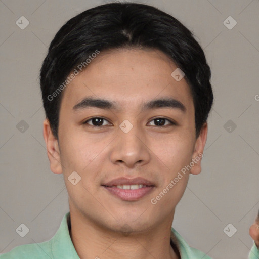 Joyful asian young-adult male with short  black hair and brown eyes