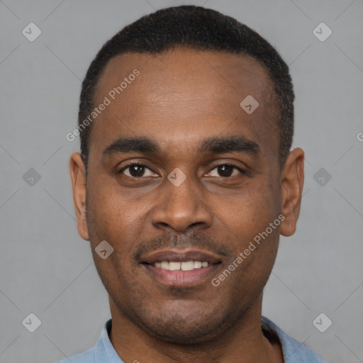 Joyful black young-adult male with short  black hair and brown eyes