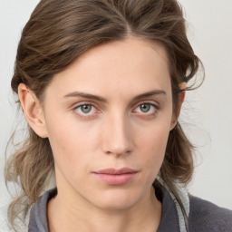 Neutral white young-adult female with medium  brown hair and grey eyes