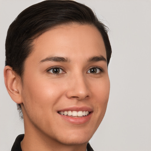 Joyful white young-adult female with short  brown hair and brown eyes