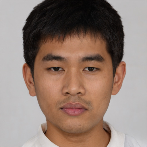Neutral asian young-adult male with short  black hair and brown eyes