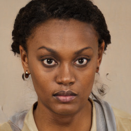 Neutral black young-adult female with short  brown hair and brown eyes