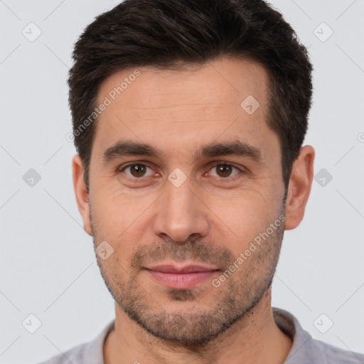 Joyful white young-adult male with short  brown hair and brown eyes