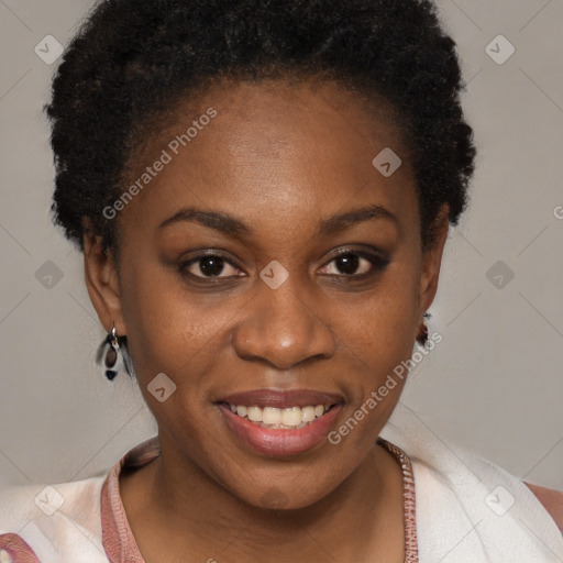 Joyful black young-adult female with short  brown hair and brown eyes