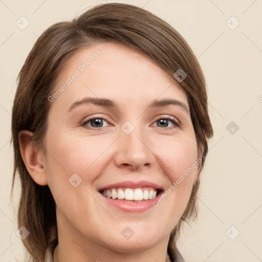 Joyful white young-adult female with medium  brown hair and grey eyes