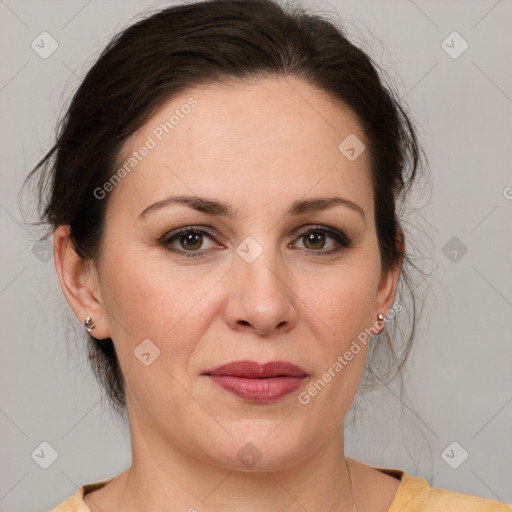 Joyful white adult female with medium  brown hair and brown eyes