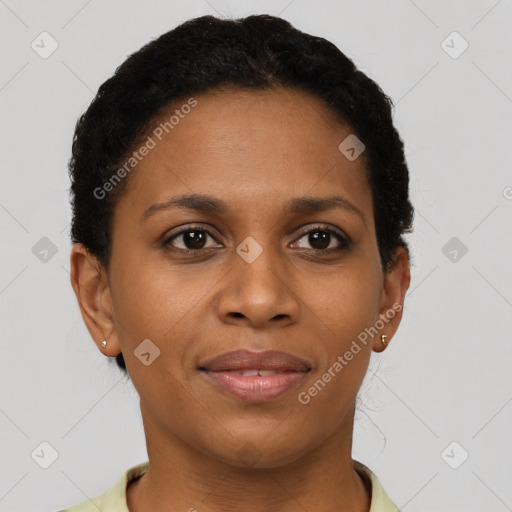 Joyful black young-adult female with short  brown hair and brown eyes