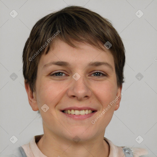 Joyful white young-adult female with short  brown hair and grey eyes