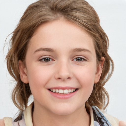 Joyful white child female with medium  brown hair and grey eyes