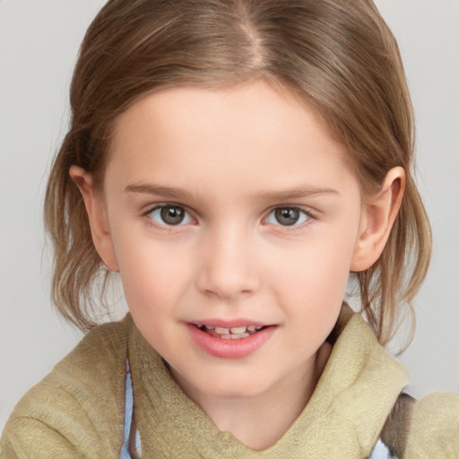 Joyful white child female with medium  brown hair and grey eyes