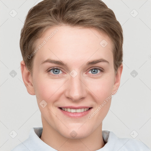 Joyful white young-adult female with short  brown hair and grey eyes