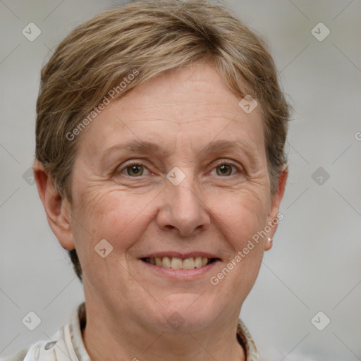 Joyful white adult female with short  brown hair and grey eyes