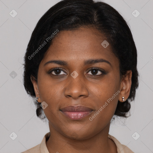 Joyful black young-adult female with medium  brown hair and brown eyes