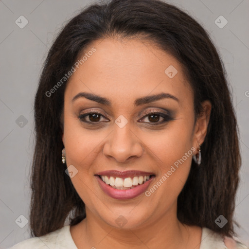 Joyful latino young-adult female with medium  brown hair and brown eyes