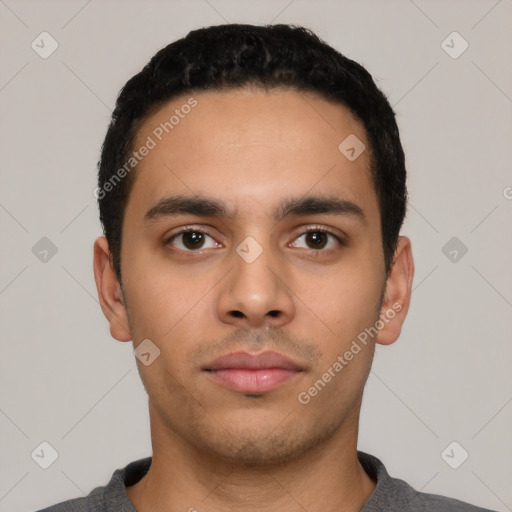 Neutral latino young-adult male with short  black hair and brown eyes