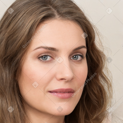 Joyful white young-adult female with long  brown hair and green eyes