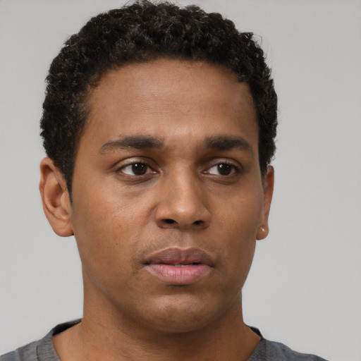 Neutral black young-adult male with short  brown hair and brown eyes