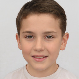 Joyful white child male with short  brown hair and brown eyes