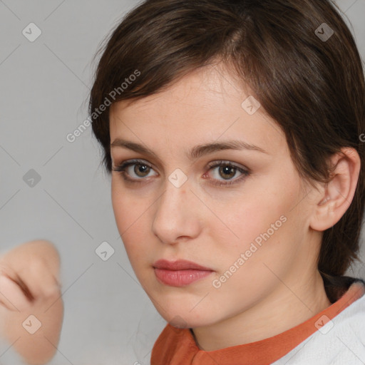 Neutral white young-adult female with medium  brown hair and brown eyes