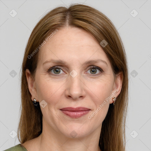 Joyful white adult female with medium  brown hair and grey eyes