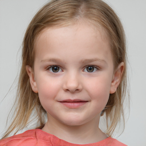 Joyful white child female with medium  brown hair and blue eyes