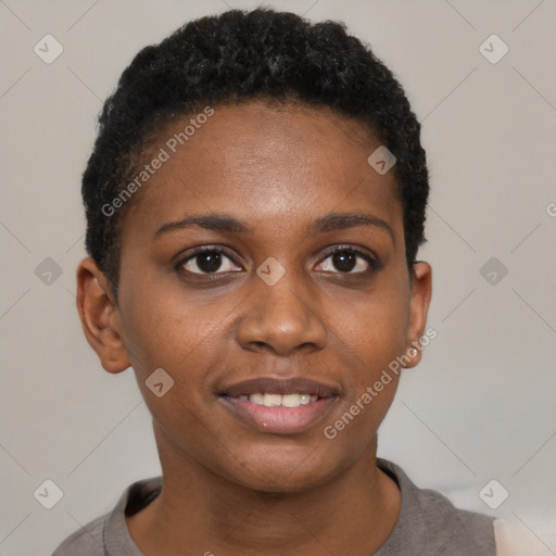 Joyful black young-adult female with short  black hair and brown eyes