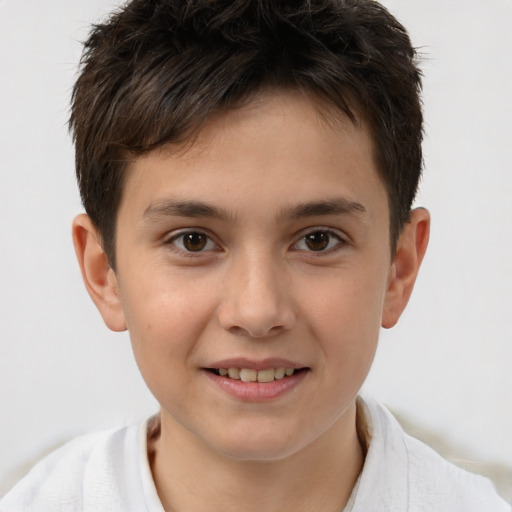 Joyful white child male with short  brown hair and brown eyes