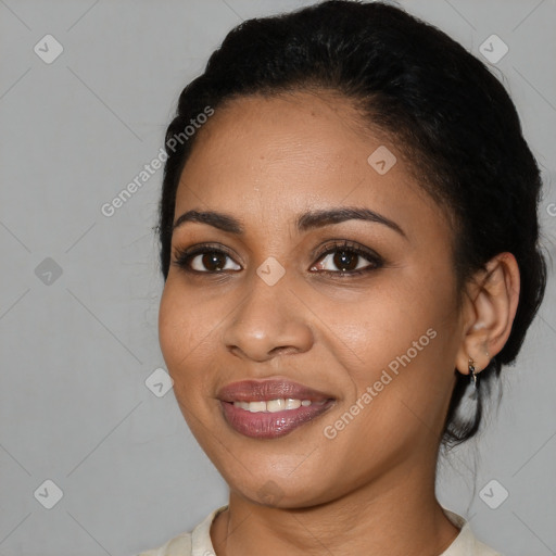 Joyful latino young-adult female with medium  black hair and brown eyes