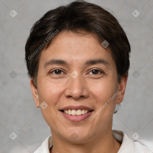 Joyful white adult female with short  brown hair and brown eyes